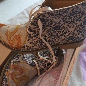 Elegant Blue and Gold Lace-Up Boots